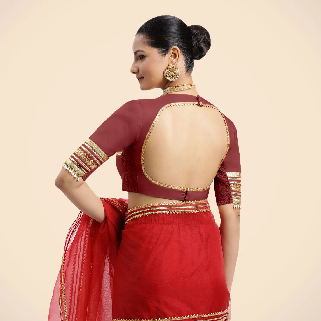 Farheen x Tyohaar | Auburn Red Embellished Elbow Sleeves FlexiFit™ Saree Blouse with Zero Neck with Back Cut-Out and Golden Gota Embellishment