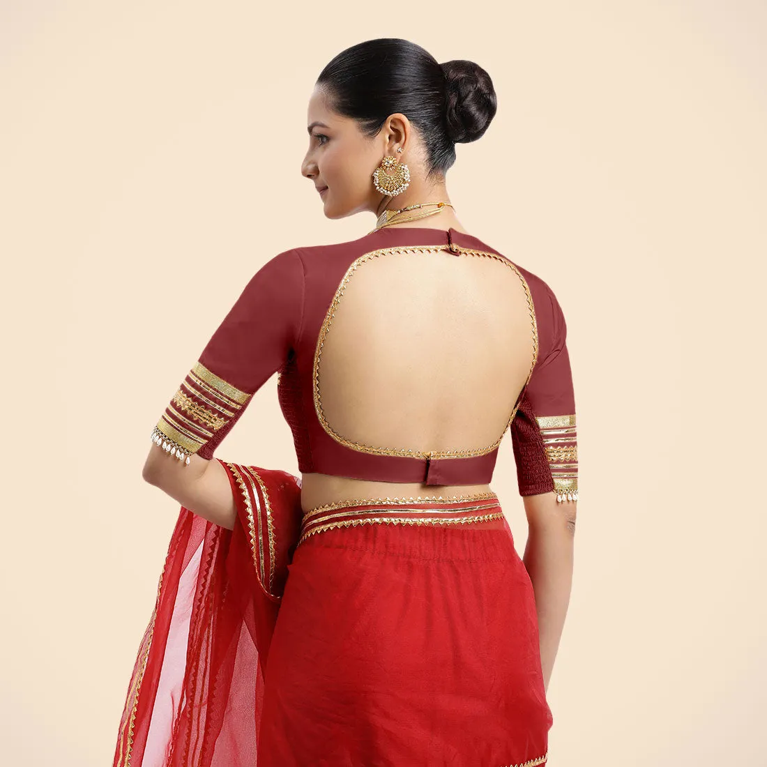 Farheen x Tyohaar | Auburn Red Embellished Elbow Sleeves FlexiFit™ Saree Blouse with Zero Neck with Back Cut-Out and Golden Gota Embellishment