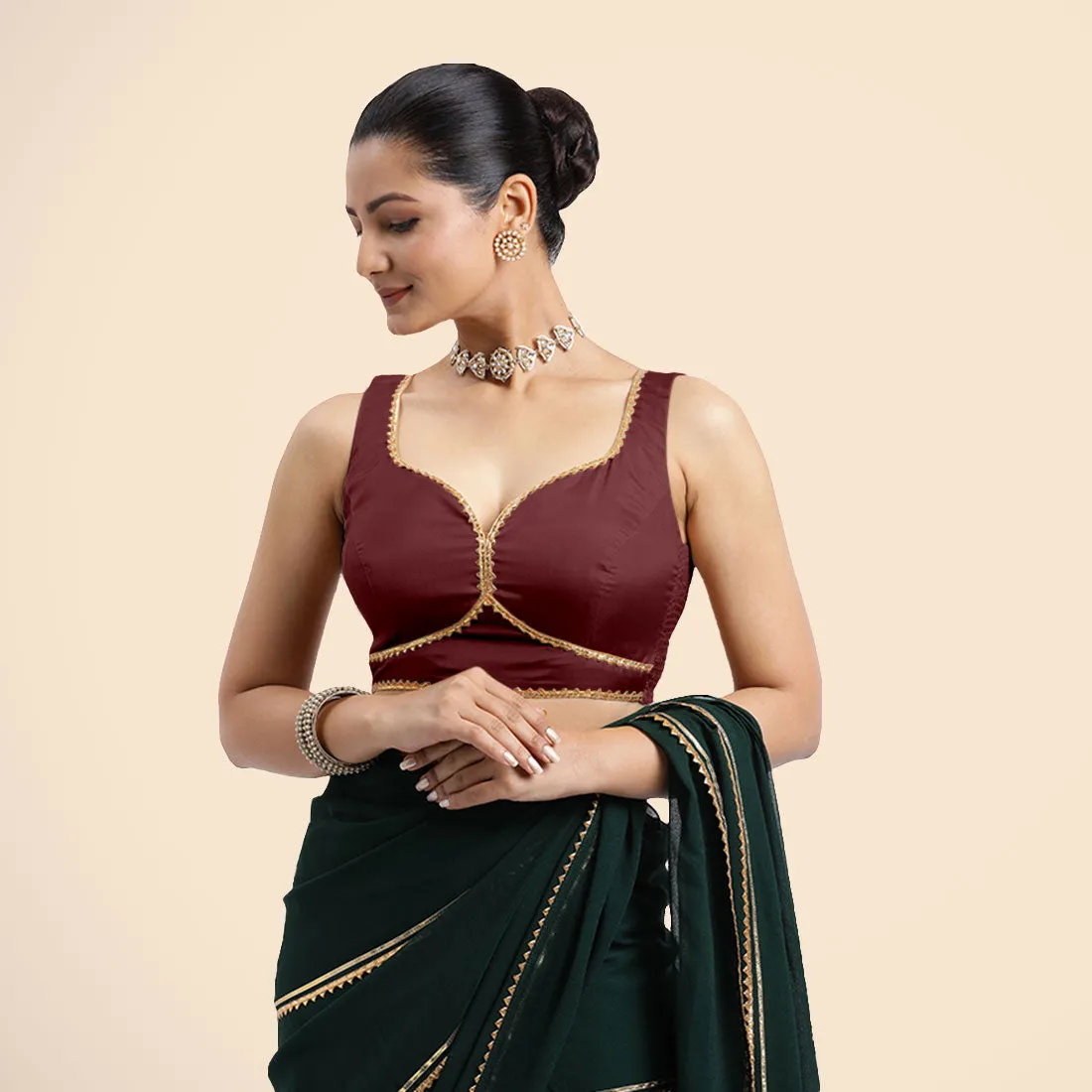 Ishika x Tyohaar | Burgundy Sleeveless FlexiFit™ Saree Blouse with Beetle Leaf Neckline with Golden Gota Lace and Back Cut-out with Tie-Up