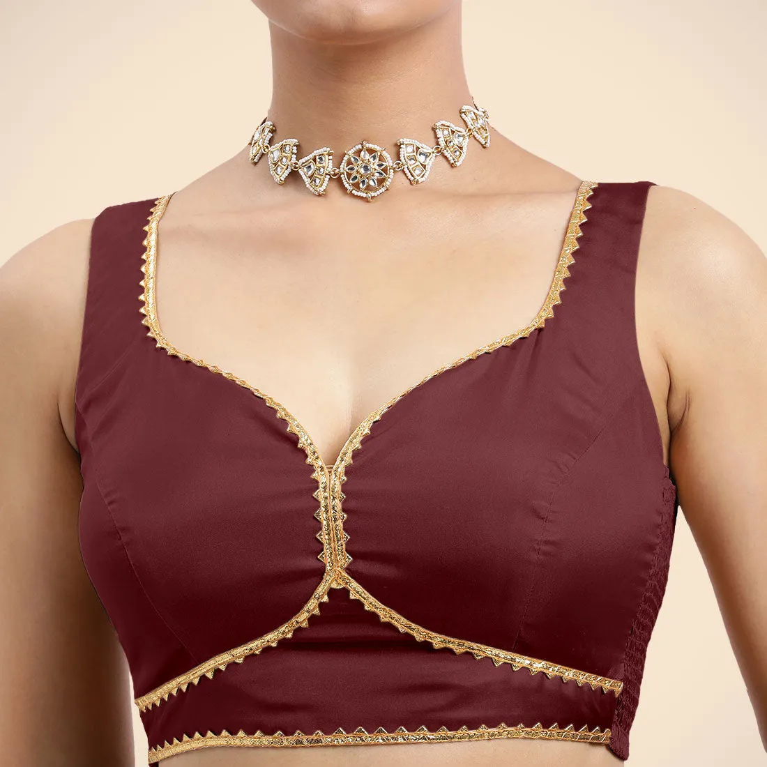 Ishika x Tyohaar | Burgundy Sleeveless FlexiFit™ Saree Blouse with Beetle Leaf Neckline with Golden Gota Lace and Back Cut-out with Tie-Up