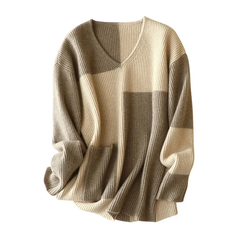 Patchwork Cashmere Sweater This Vneck beauty is the wrapped up in 100 luxurious cashmere winter